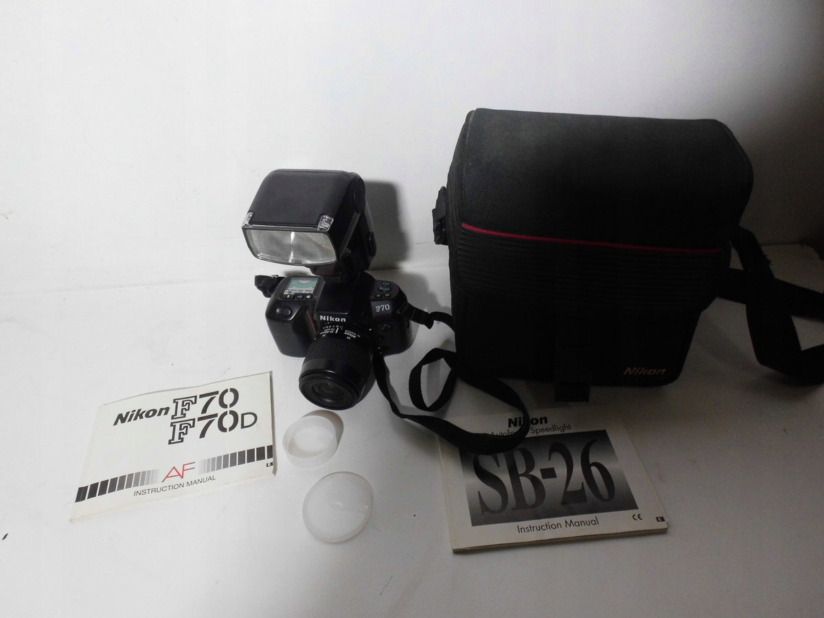 Camera Nikon F70 + Nikkor lens 35-80mm + lamp + cover