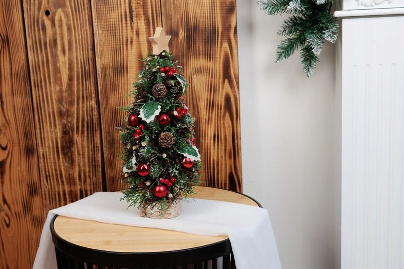 Christmas tree on the base with a star measuring 18x40 cm Manufacturer code 8091723