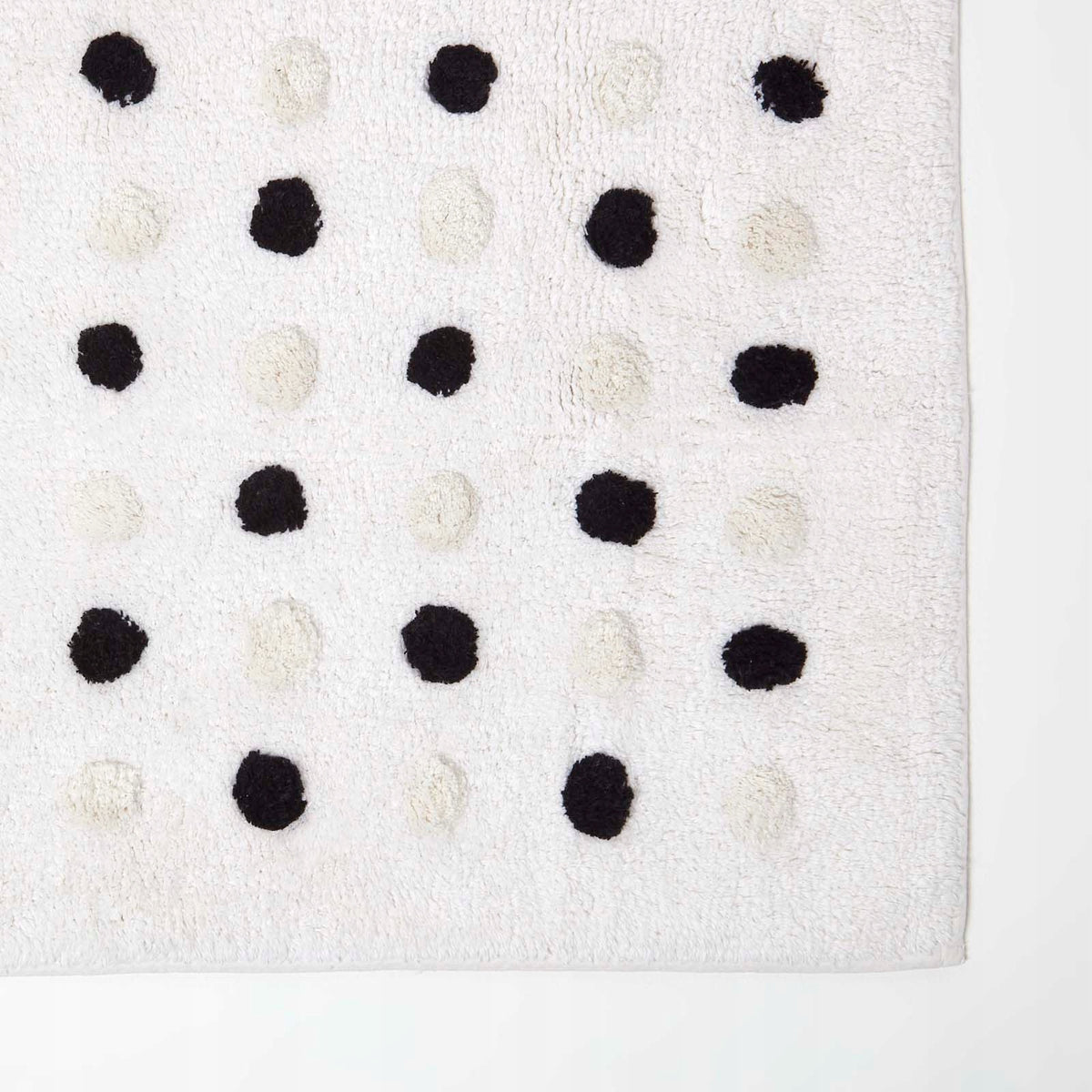 HOMESCAPES Cotton dotted rug, black and white 50x80cm EAN (GTIN) 5056280734161