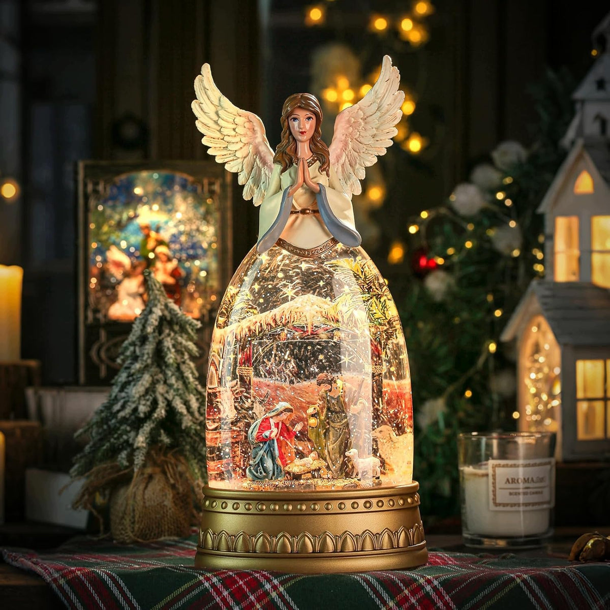 Music Box in the shape of a snowball in the shape of the Nativity of the Lord angel