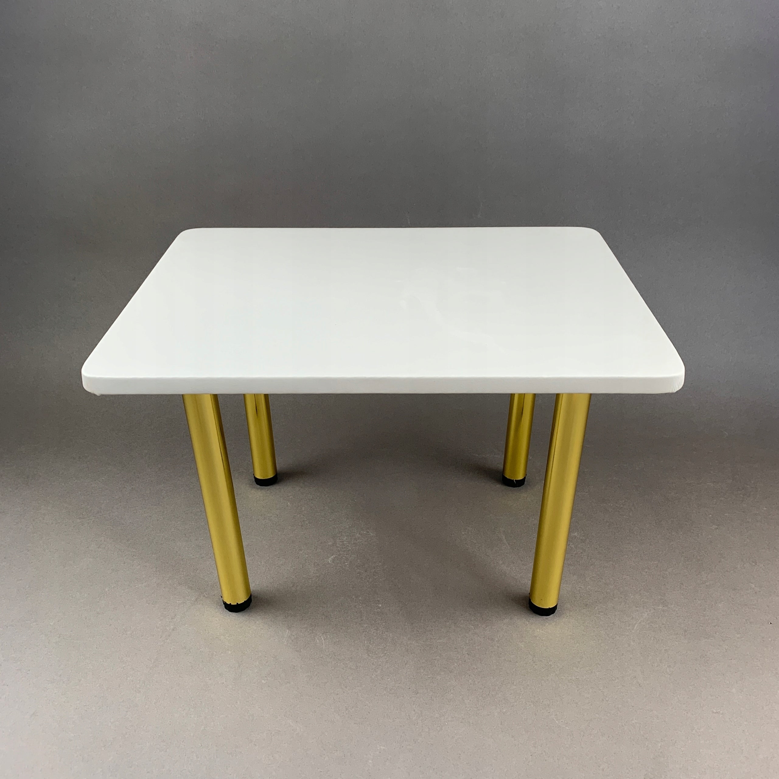Pedicure stand for UV lamp or bathtub. Upholstery: White. Feet: Gold. Medical device no