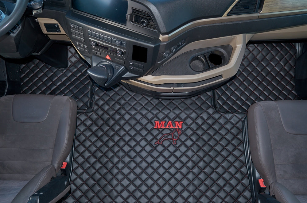 QUILTED CARPETS - MAN TGX from 2021 - black with red stitching