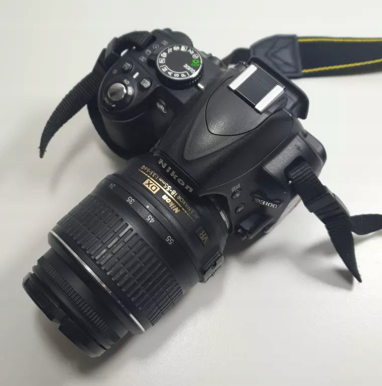 SLR camera Nikon D3100 body + lens Manufacturer code D3100