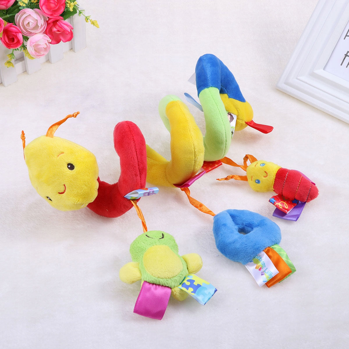 SPIRAL TOY FOR BABY ON STROLLER CRIB SEAT WITH BELL Manufacturer code 1922453