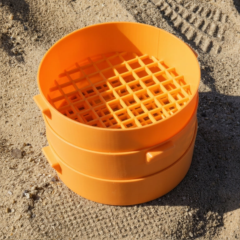 Set of orange strainers for sifting sand on the beach for children Packaging status original