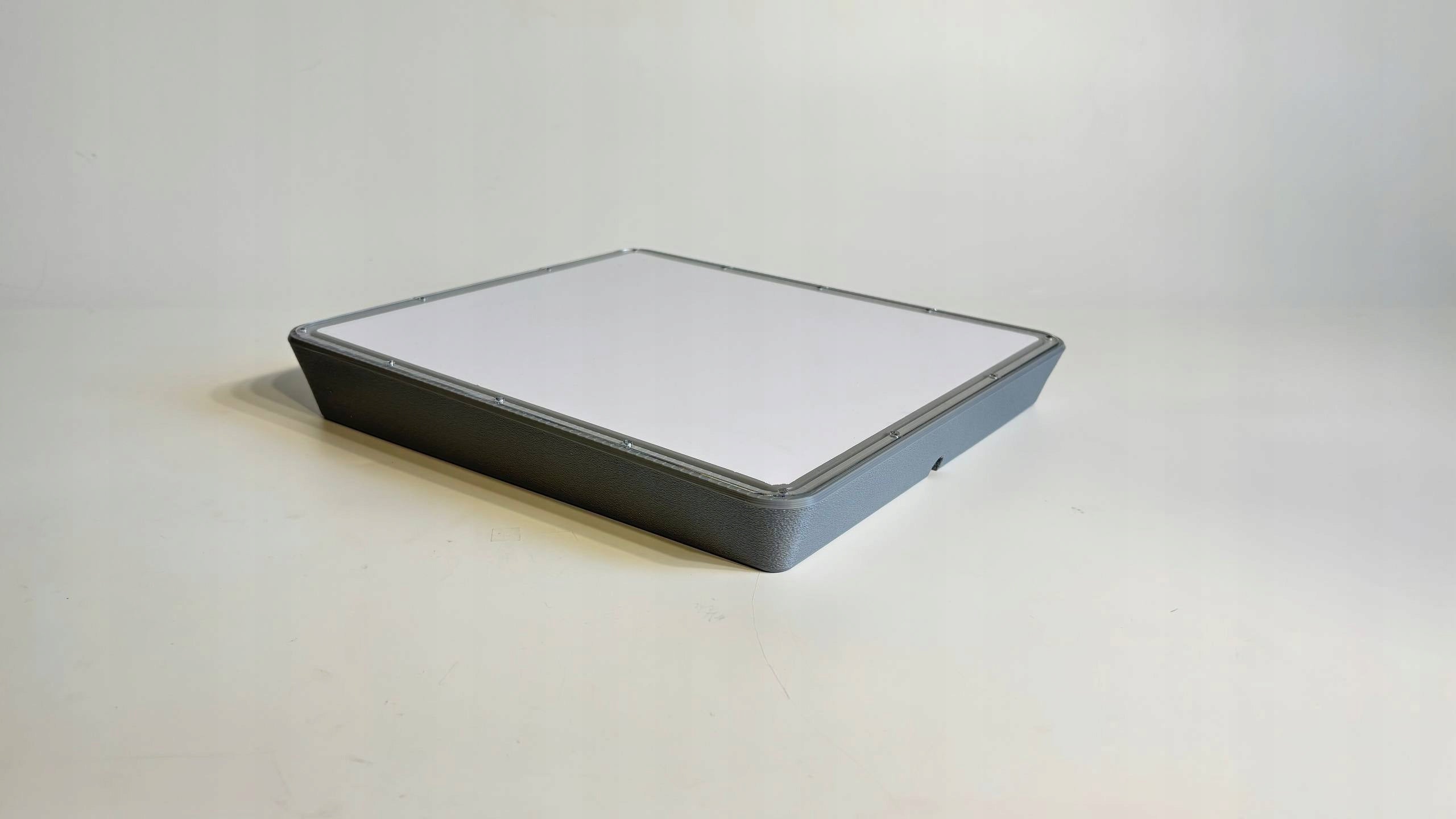Starlink mini mounting bracket on the roof of the motorhome. Grey