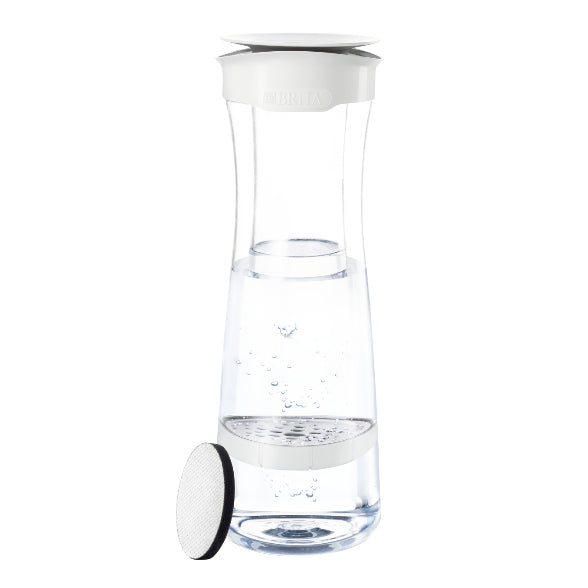 White decanter for water filtering BRITA + filter cartridge MicroDisc Packaging status original