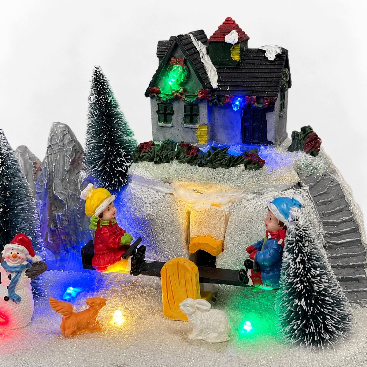 CHRISTMAS LED VILLAGE WITH SNOWMAN HOUSE AND MOVABLE SWING DECORATION Brand Flying Tiger