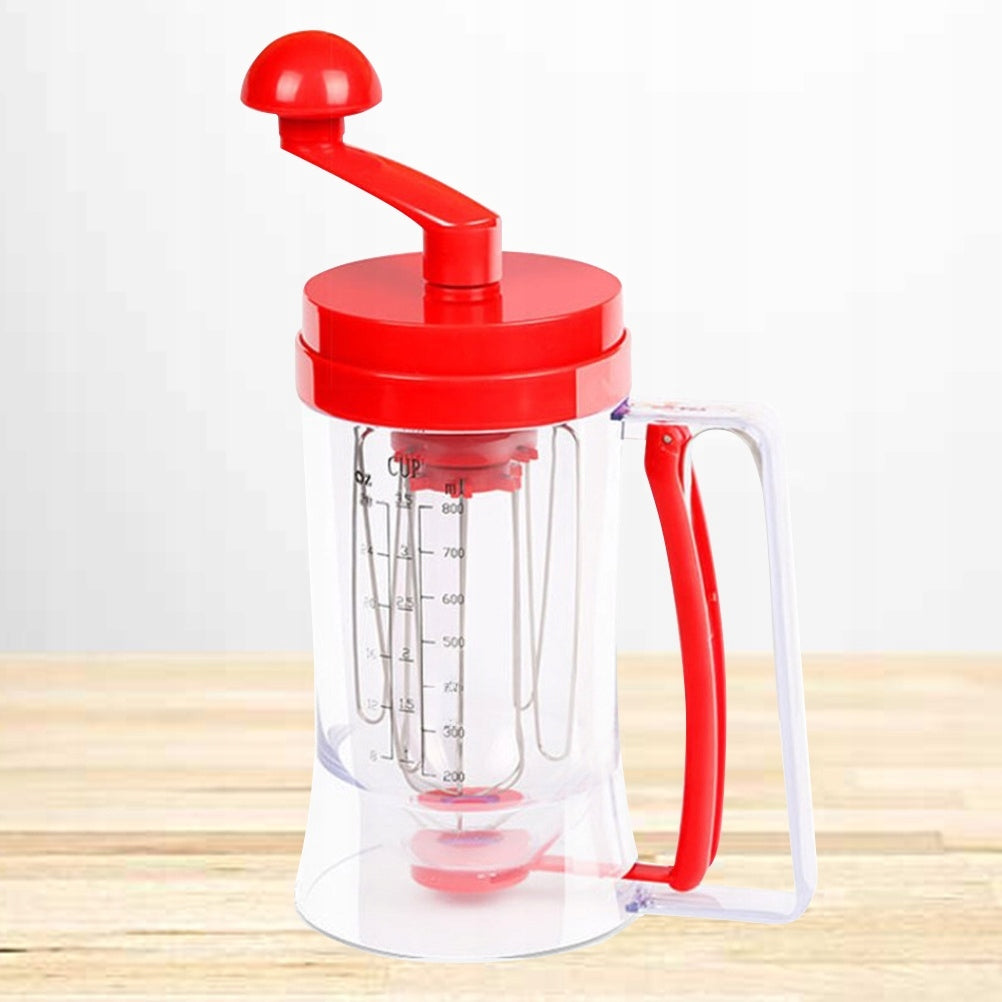 CZERWONY RĘCZNY DOZOWNIK DO CIASTA Z ERGONOMICZNĄ RĄCZKĄ I MIESZADŁEM Dominant color red