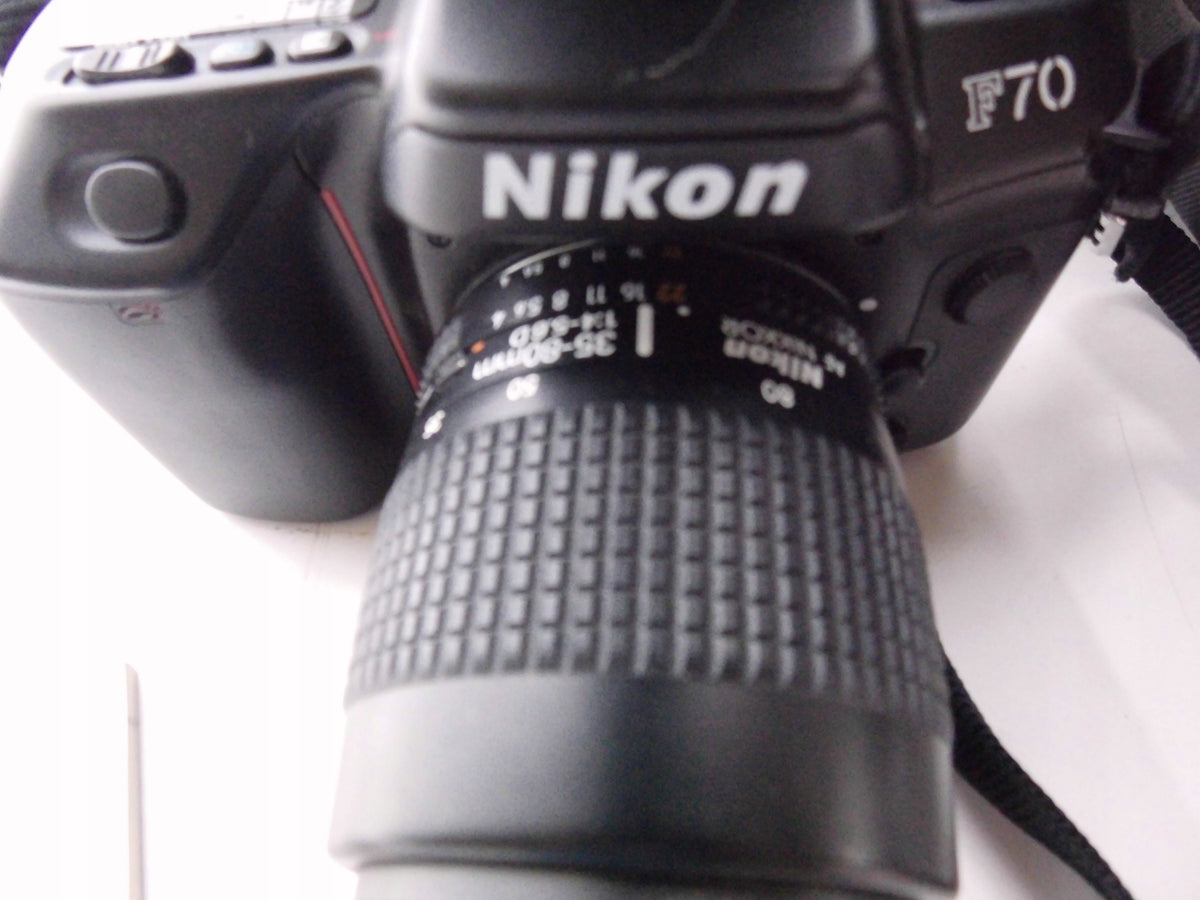 Camera Nikon F70 + Nikkor lens 35-80mm + lamp + cover Brand Nikon