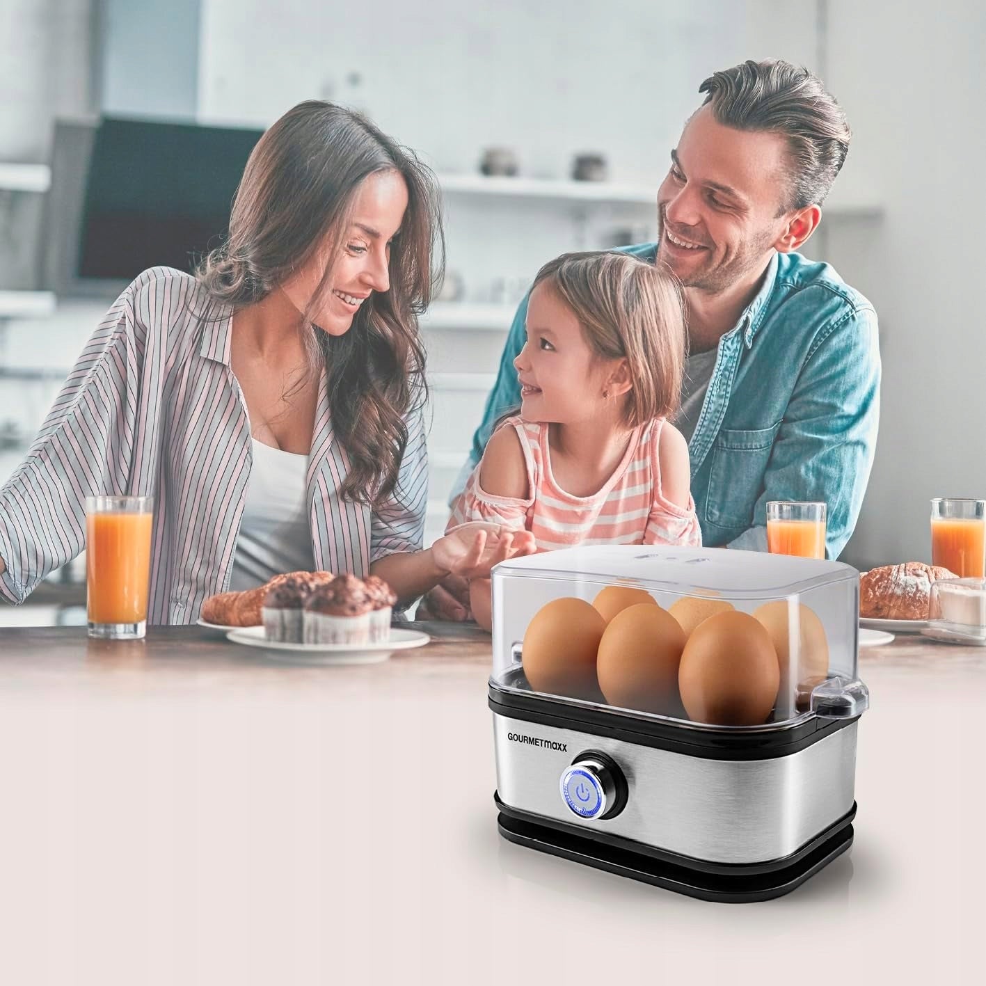 EGG COOKER FOR 6 EGGS WITH PUNCHER IN CUP WITH MEASURING CUP 3 DEGREES OF HARDNESS Dominant color gray