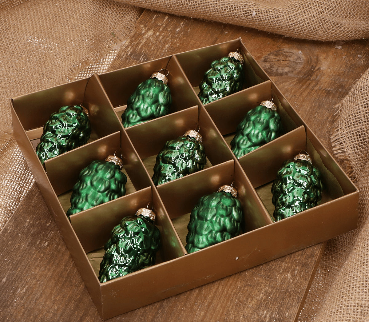 Glass cones green 9cm- 9 pieces in gold packaging Longest dimension 9 cm
