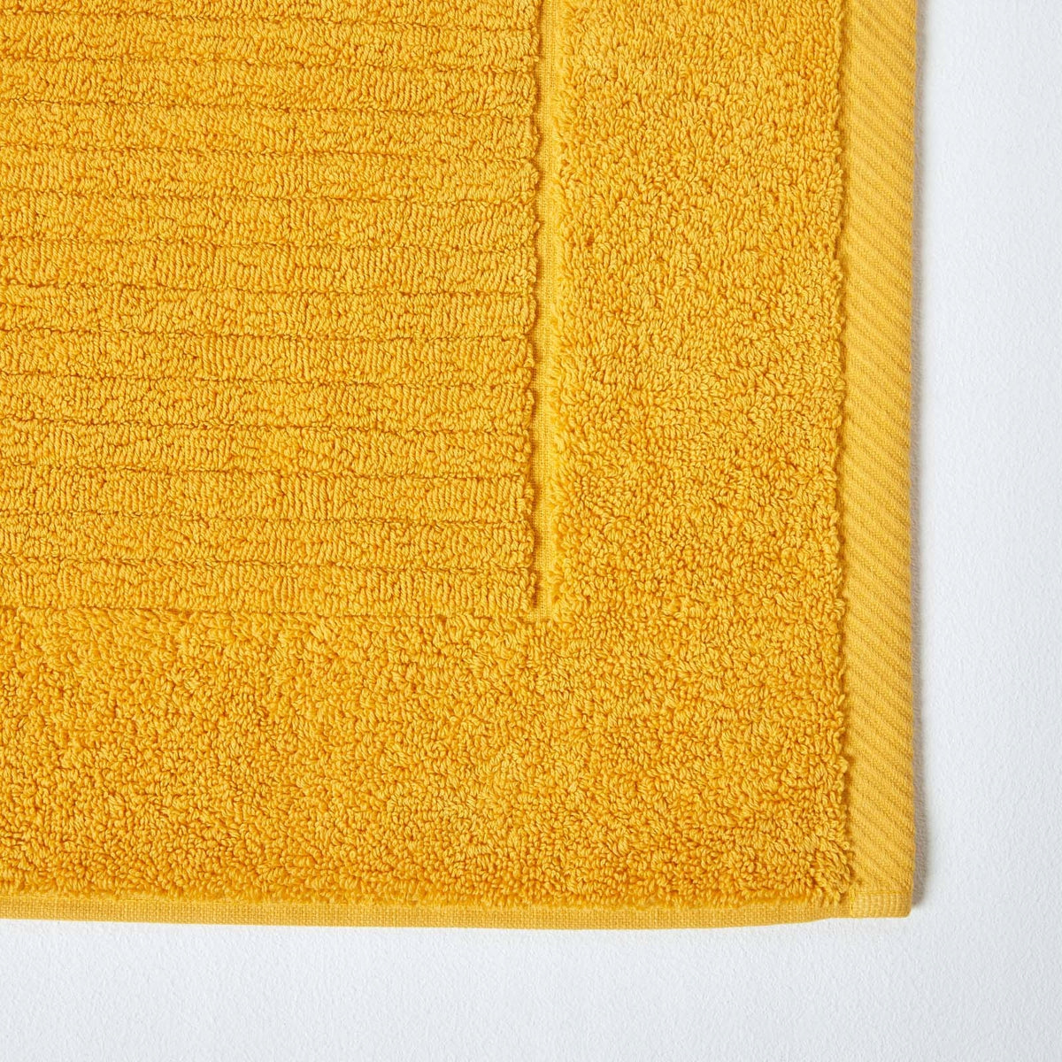 HOMESCAPES Imperial Cotton Ochre Yellow Bathroom Rug 50x80cm Packaging status original