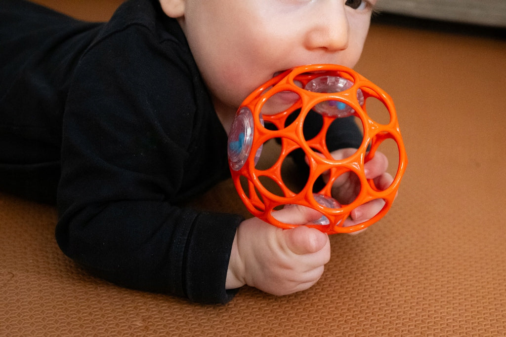 Oball rattle teether orange ball Brand Bright Starts