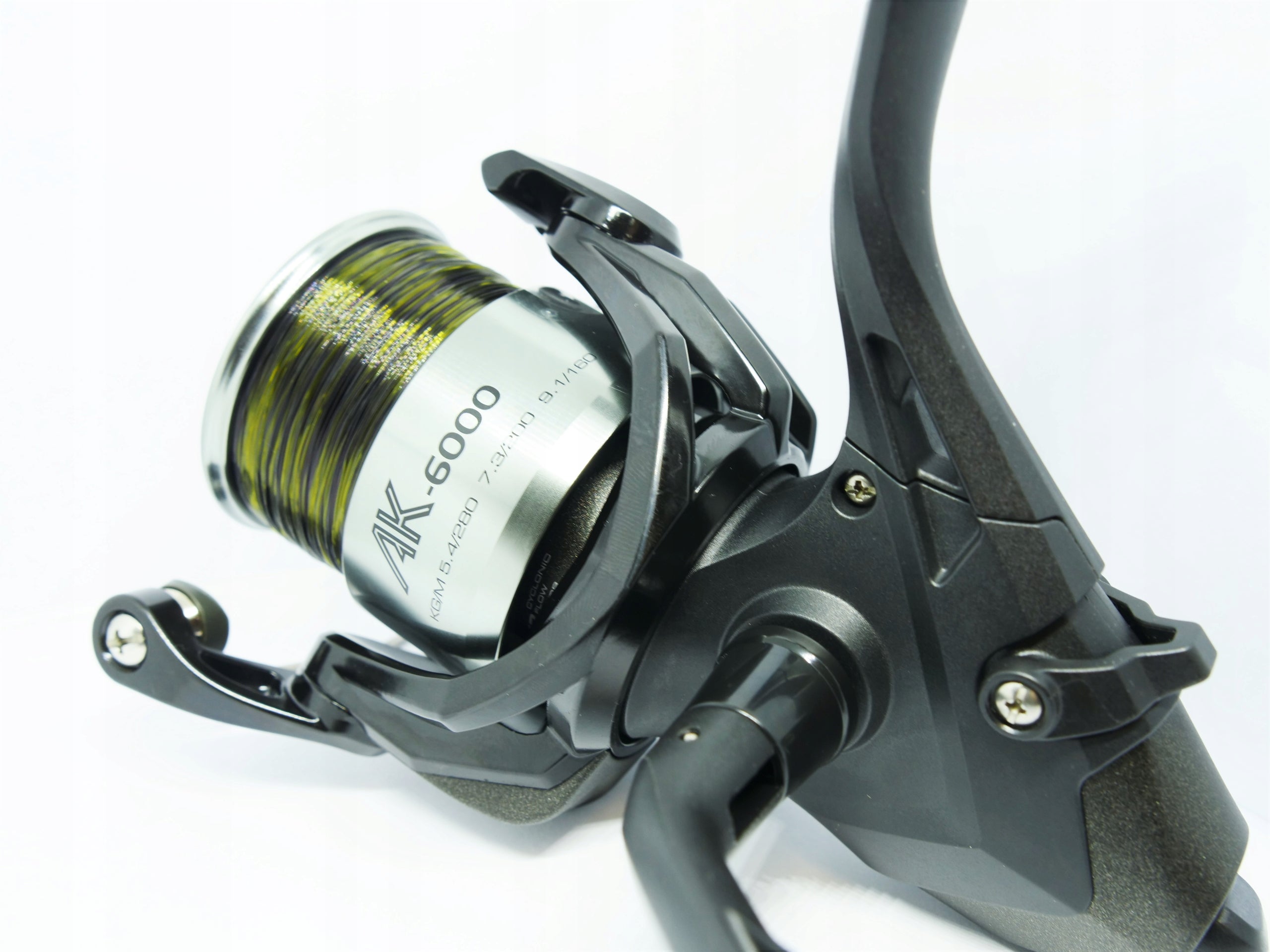 Reel Okuma AK 6000 Baitfeeder with wound line Packaging status original