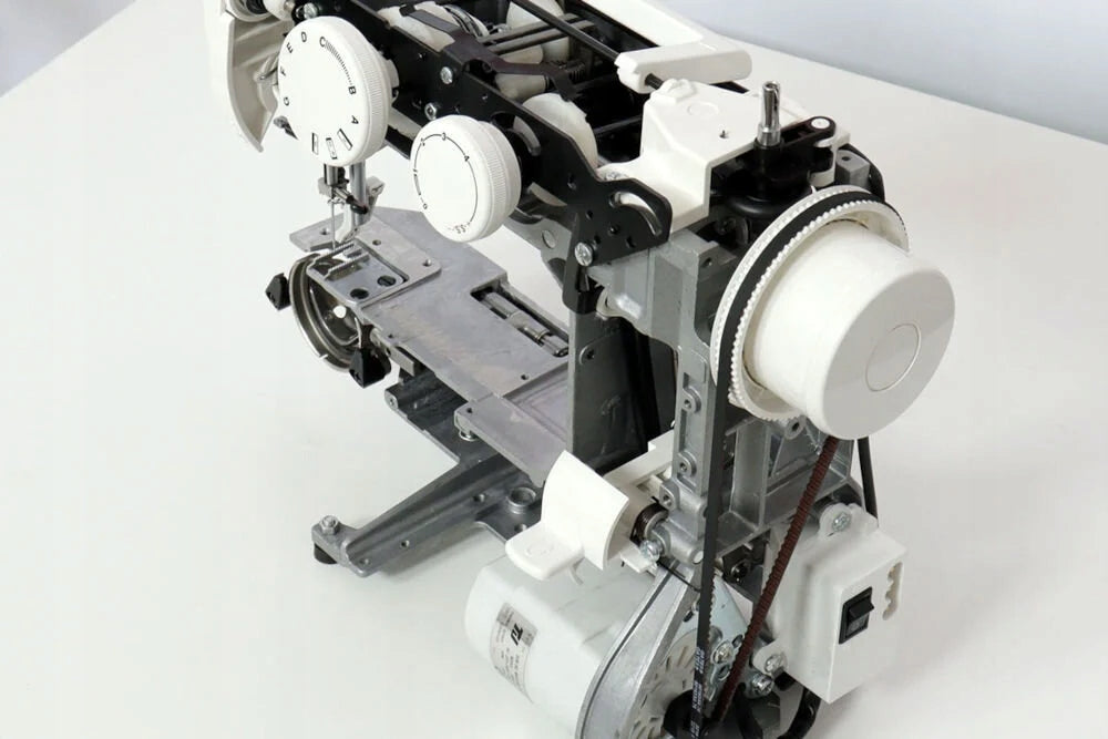 Sewing machine JANOME Juno E1015 Green Types of stitches zigzag straight elastic invisible overlock