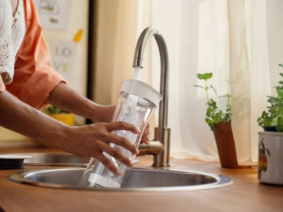 White decanter for water filtering BRITA + filter cartridge MicroDisc Brand Brita